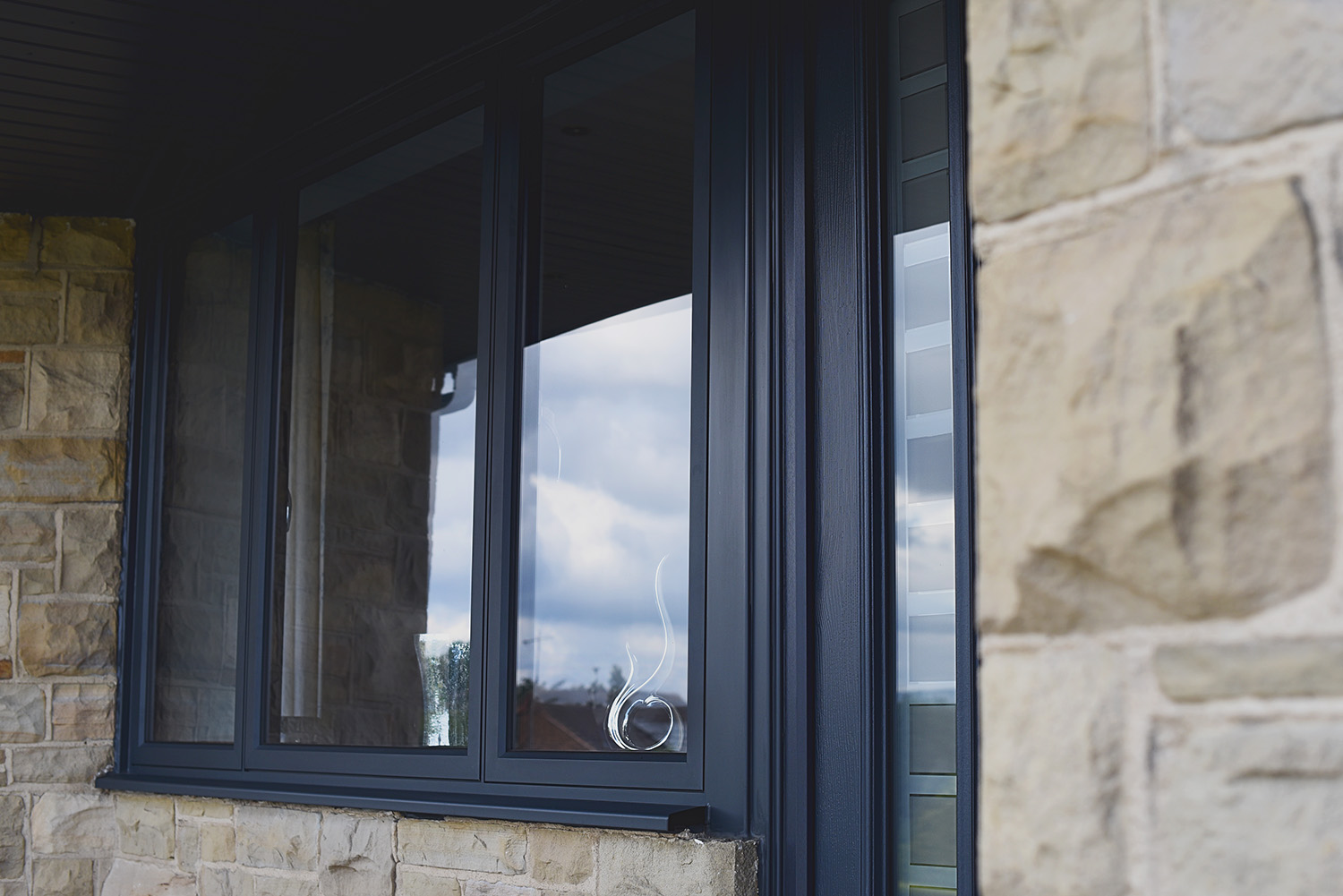 Black aluminium windows for a home in Wiltshire.