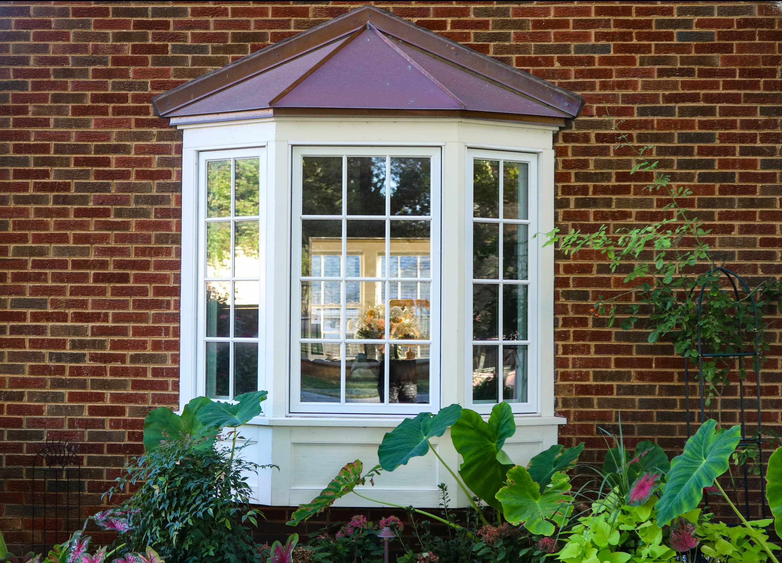 White bow and bay windows for a home in Wiltshire.