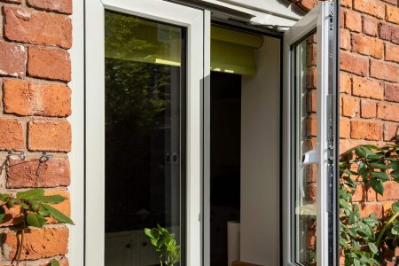 Grey flush casement windows for a home in Wiltshire