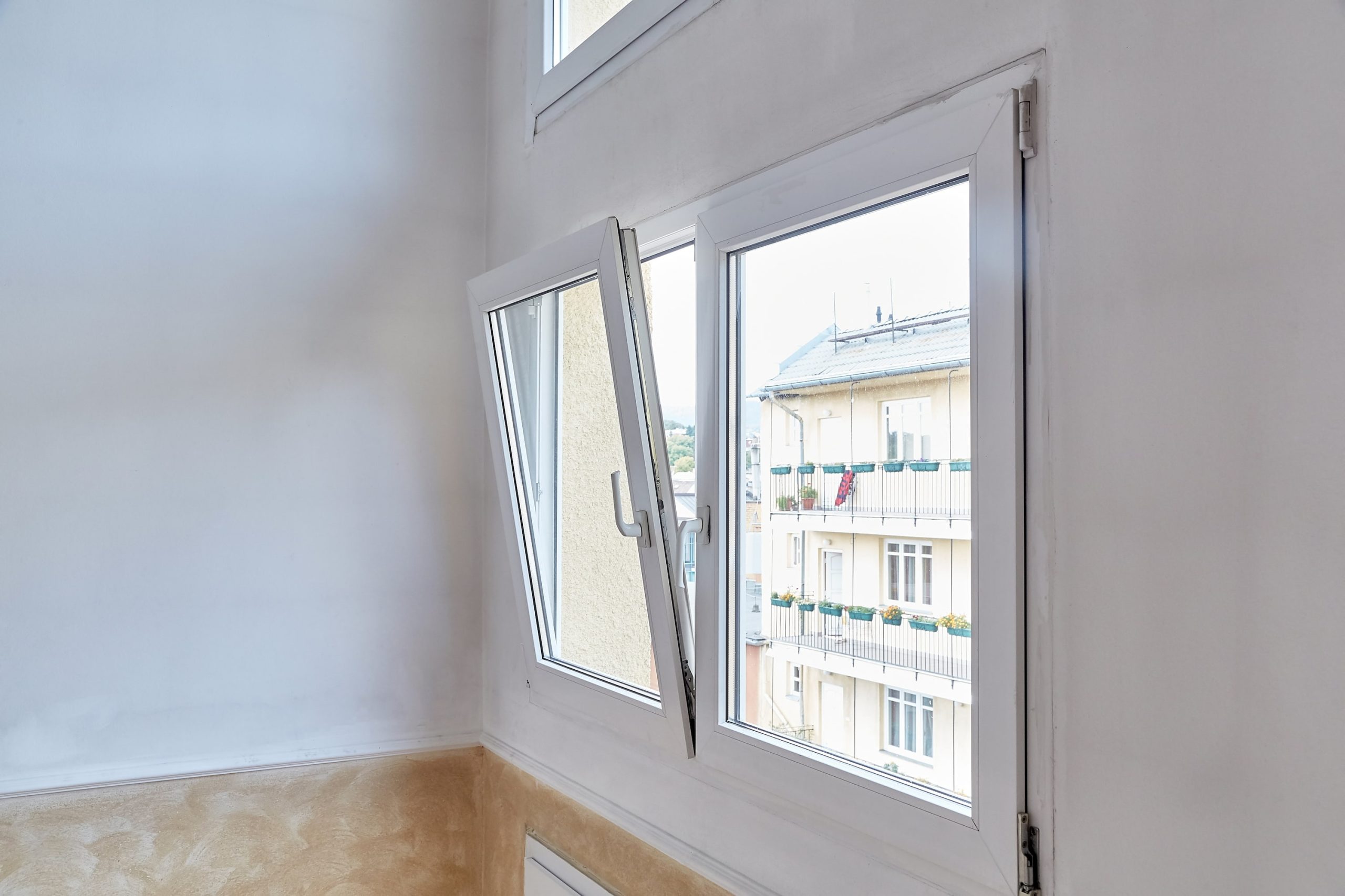 White tilt and turn windows for a home in Wiltshire.