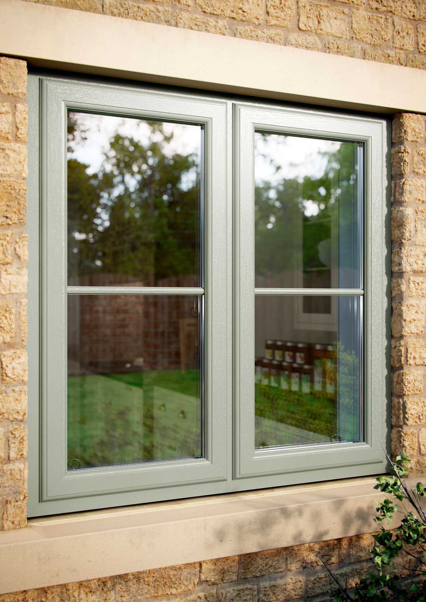 Green French casement windows for a Wiltshire home.